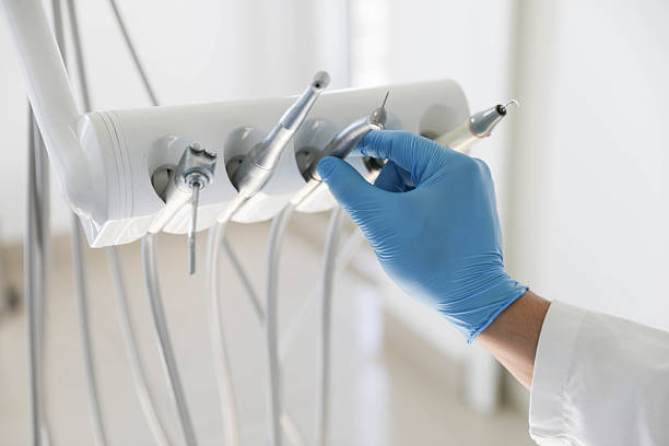 Professional Tooth Extraction technician working in West Kennebunk, ME